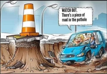 Lake Pleasant Rd. pothole.jpg