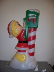 elf mails letter to santa.jpg