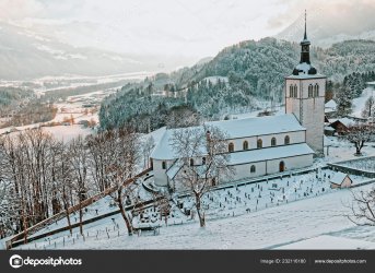 depositphotos_232116180-stock-photo-church-alpine-mountains-gruyeres-town.jpg