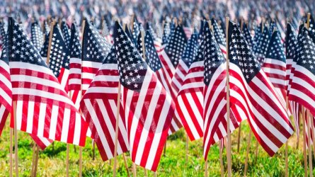 A-Field-Of-American-Flags-On-A-Grassy-Hill-In-Boston-Common-Park-iStock-1135805187-1280x720.jpg